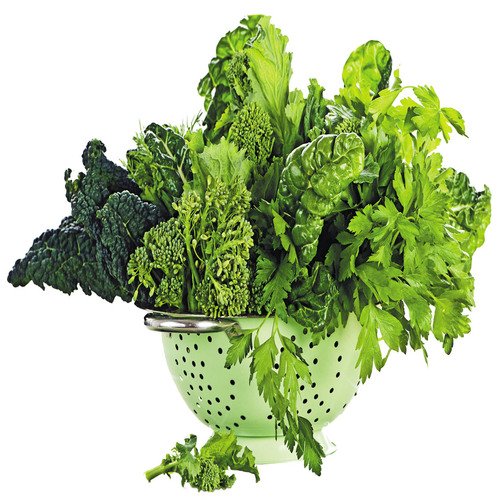 Different types of green vegetables in a stainless colander